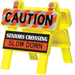 Mini Senior Moments Plastic Safety Barricade. 4.4in x 5in